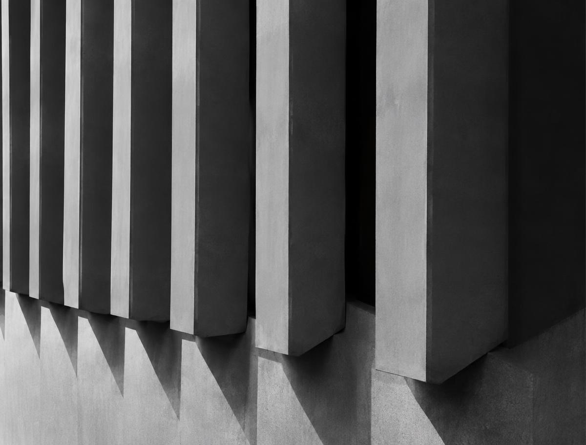Concrete fins casting precise shadows